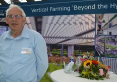 Arie de Gelder in the booth of Wageningen University & Research, with special focus on vertical farming.